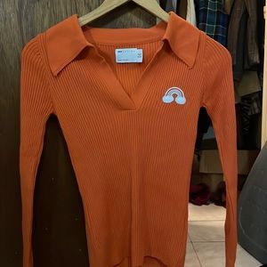 orange long sleeve top